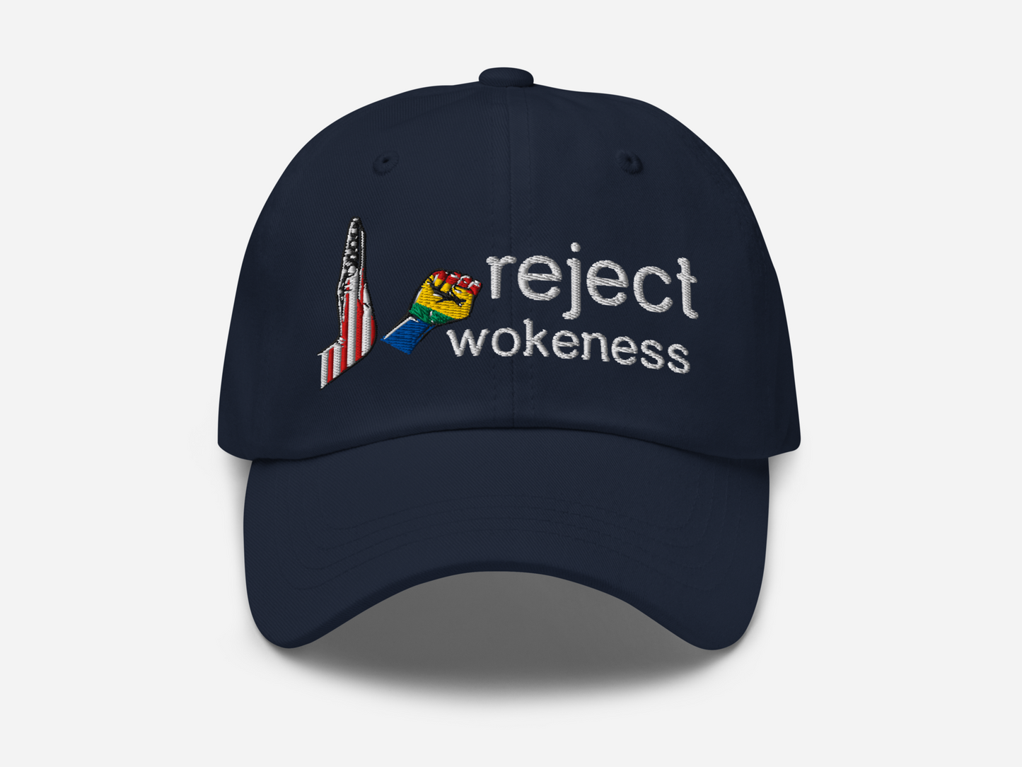 Navy dad hat with 'reject wokeness' embroidered in white text, accompanied by a colorful fist and a stylized American flag design on the front, displayed against a white background