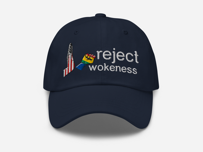 Navy dad hat with 'reject wokeness' embroidered in white text, accompanied by a colorful fist and a stylized American flag design on the front, displayed against a white background